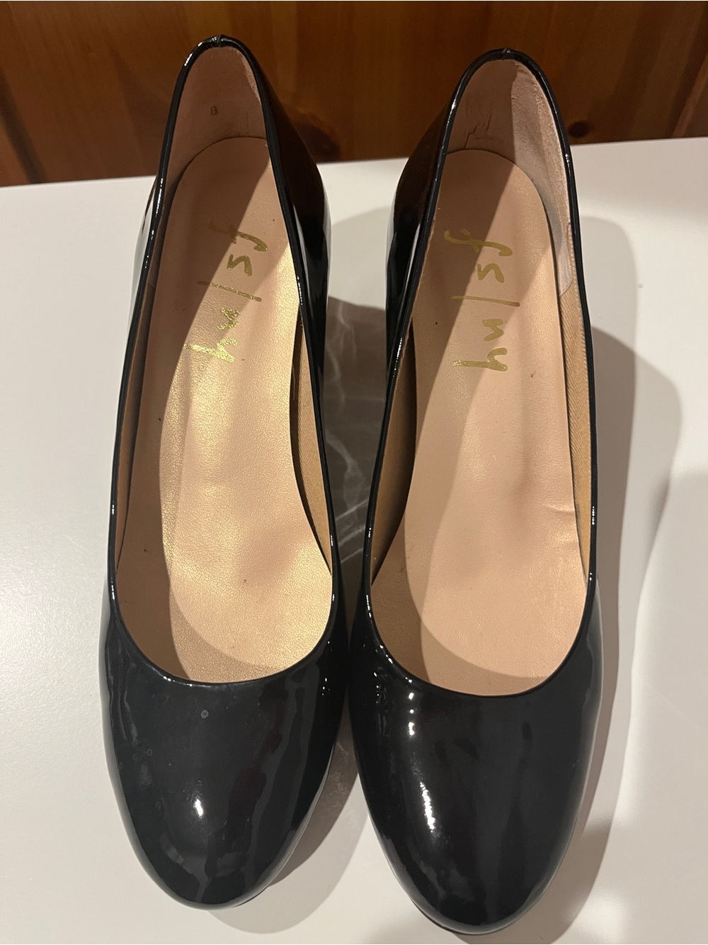 French Sole Trance pumps in black patent leather